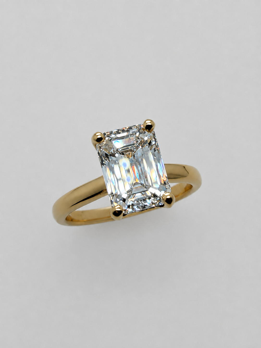 Emerald Cut Hidden Halo Ring